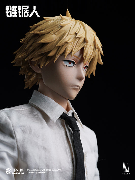 Chainsaw Man collectible figure with fine detailing on boots, belt, and uniform.