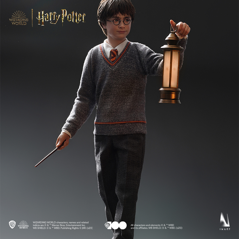 Miniature Harry Potter with authentic wizarding attire