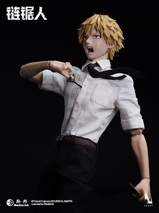 Dynamic Denji action figure posed mid-attack with chainsaws roaring.