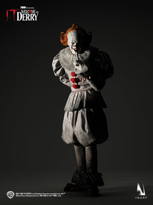 INART Pennywise 1/6 figure holding a meteorite dagger across his costume