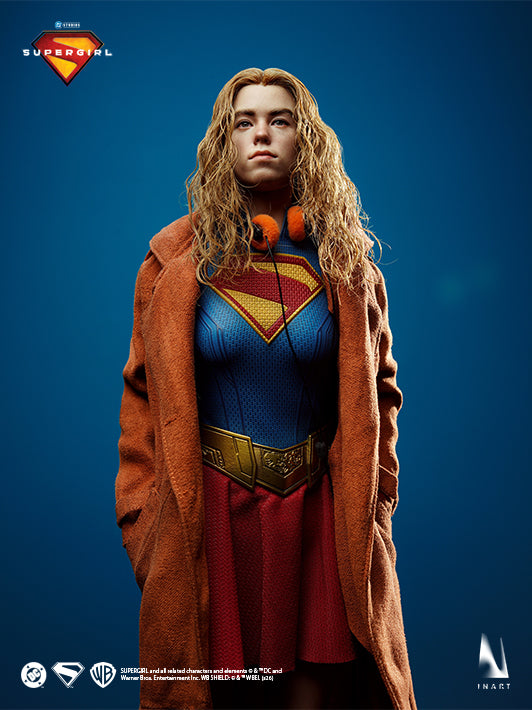 INART Supergirl figure wearing a brown trench coat and orange headphones