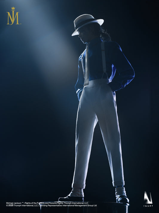 Lifelike Michael Jackson action figure with the white suit jacket removed, revealing a blue shirt underneath