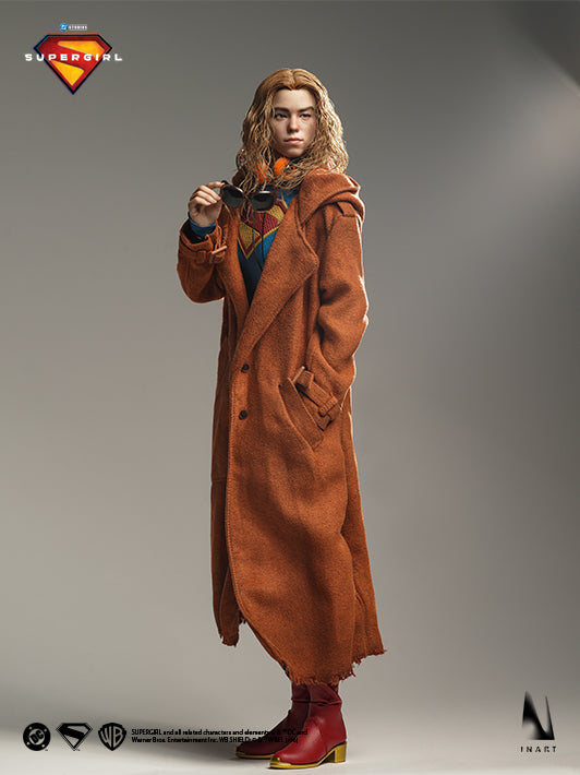 Supergirl 2026 collectible figure wearing a brown trench coat with accessories