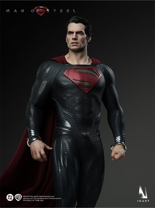Three-quarter view of the INART Man of Steel Superman figure with clenched fists and draped cape