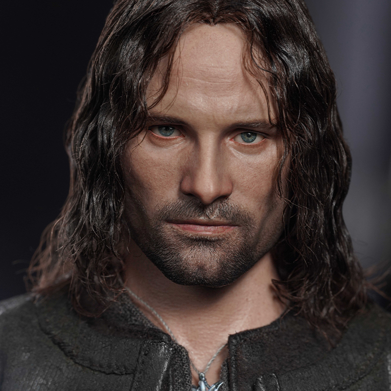 Aragorn collectible figure from INART, featuring authentic Middle-earth accessories.
