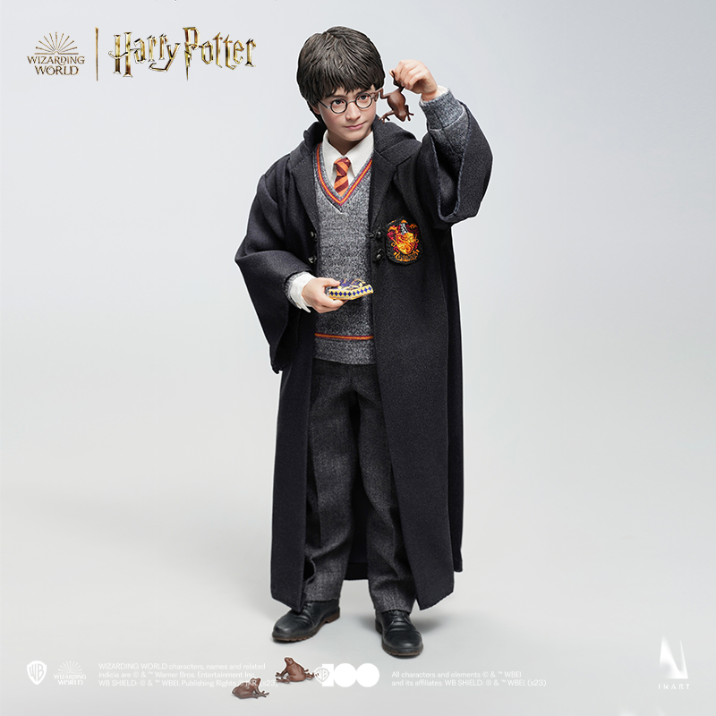 Miniature statue of Harry Potter with Gryffindor robes