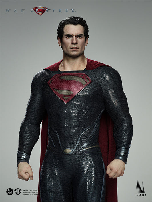 Front upper-body view of the INART Man of Steel Superman figure showing the Kryptonian suit and chest emblem