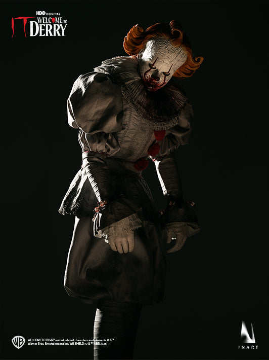 Pennywise 1/6 figure leaning forward with sinister laughing expression