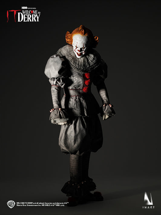 Pennywise collectible figure standing with machete in dark studio lighting