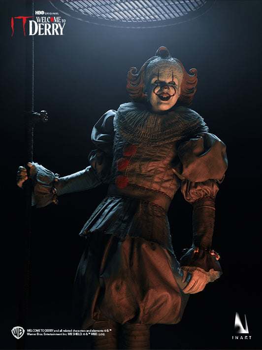 Welcome to Derry Pennywise figure holding a dagger beneath a sewer grate